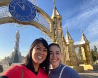 The writer (left) and a friend in front of the Independence and Freedom Monument in Dushanbe, Tajikistan. 