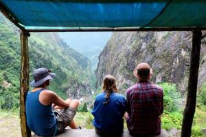 A moment of contemplation with friends after a gruelling afternoon of trekking in Nepal.