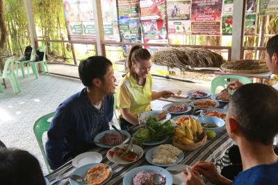 Caroline sampling Isaan&#039;s cuisine.